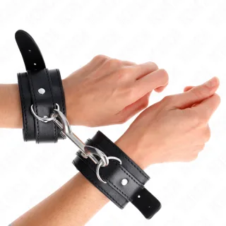 Fetisch-Toy KINK Handfesseln mit einer Nietenreihe Schwarz 28 cm